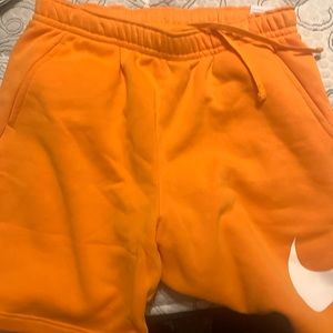 ORANGE NIKE SHORTS